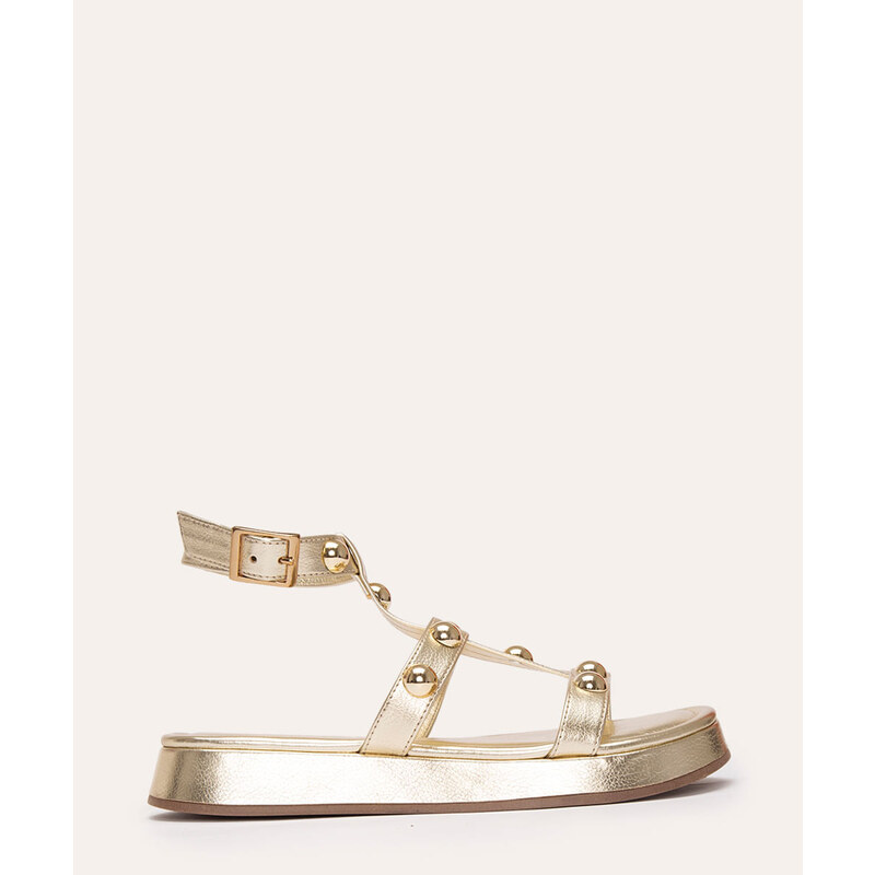 C&A sandália flatform tachas via uno dourado